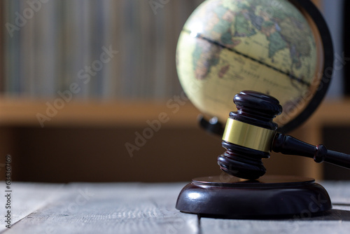 Environmental law is a collective term encompassing aspects of the law that provide protection to the environment. The concept of global natural law and environmental judgment. photo