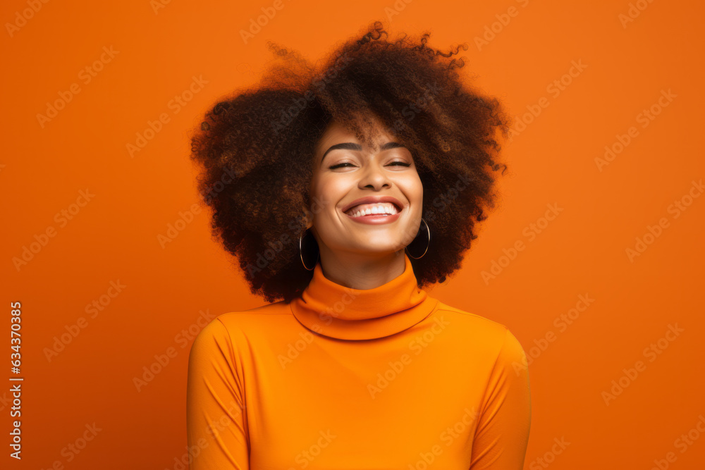 Radiant Black Woman with Infectious Smile on Vibrant Orange Studio Background Radiant Black Woman with Infectious Smile on Vibrant Orange Studio Background