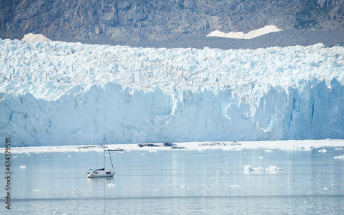 Small ship dwarfed by the Margerie Glacier in the Tarr Inlet, Glacier Bay National Park, Alaska © Alan