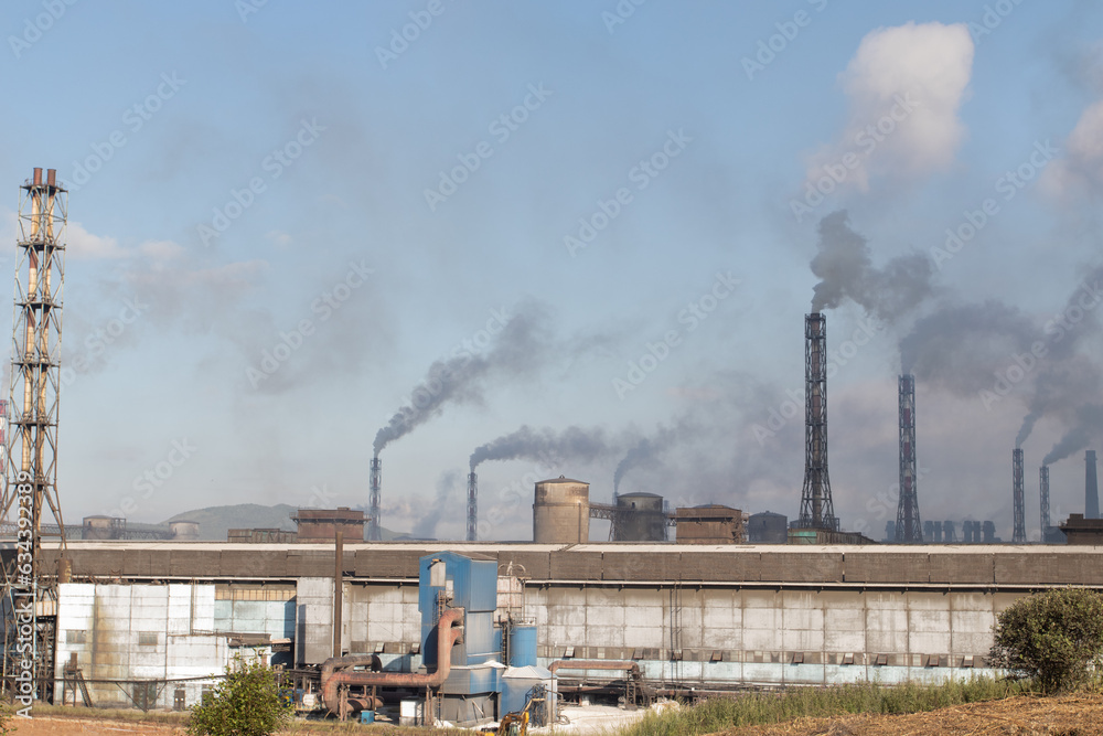 Air pollution from smokeout of factory chimneys.