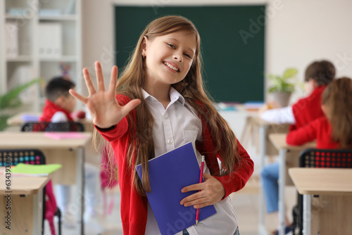 Little schoolgirl with copy...