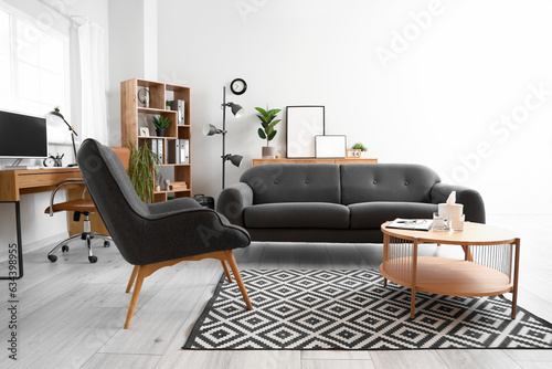 Interior of psychologist's office with sofa and table