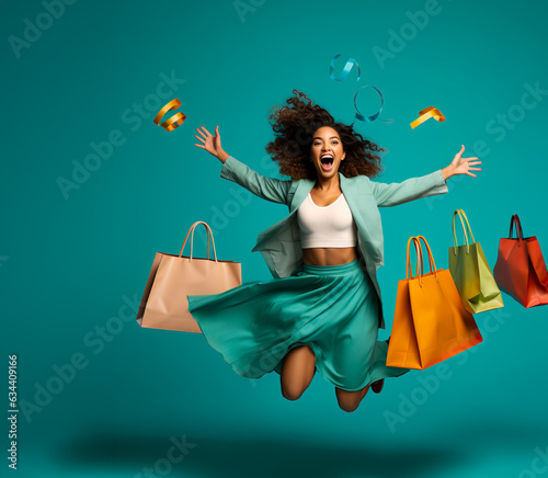 Joyful happy Woman Shopping. Shopping bags and confetti on a studio background. Concept of Shopping, Retail, Sale, Black Friday or Cyber Monday.
