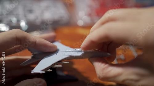 Assembling jet plane plastic model kit