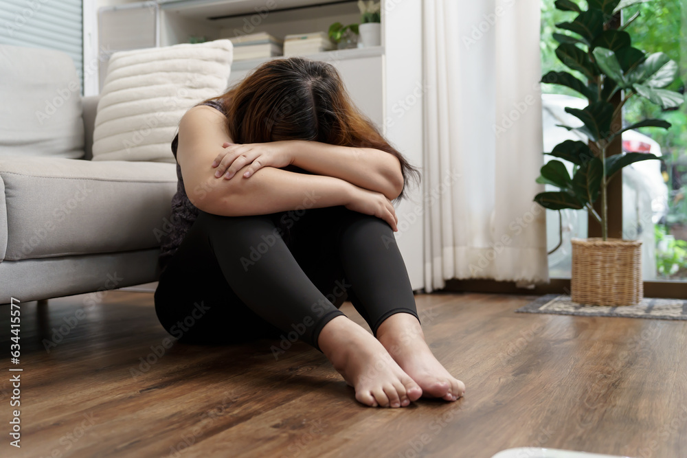 Sad woman with fat upset bored of dieting Weight loss fail Fat diet and scale sad asian woman on weight scale at home weight control Sad woman with fat upset bored of dieting Weight loss fail Fat diet and scale sad asian woman on weight scale at home weight control