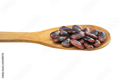 Spotted bean grains lying in a wooden spoon isolated on a transparent background. Side view.