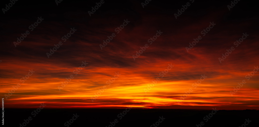 Aerial and panoramic view of cloud. vibrant color evening sky. Real cloud sunrise or sundown sky background with gentle clouds. sky sunset for background panorama concept. Skyline of sunset or morning