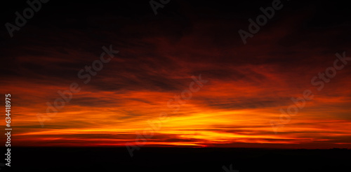 Aerial and panoramic view of cloud. vibrant color evening sky. Real cloud sunrise or sundown sky background with gentle clouds. sky sunset for background panorama concept. Skyline of sunset or morning