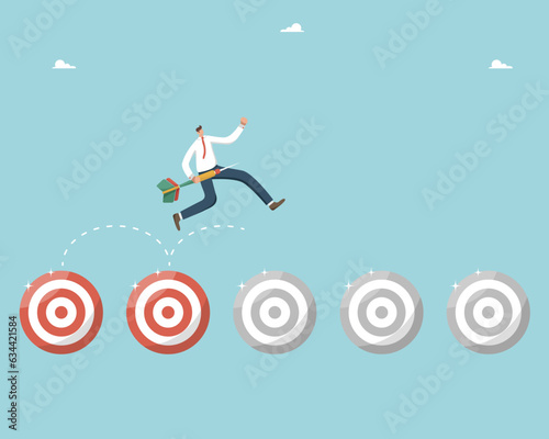 Setting and planning the path to success, tracking the progress of the workflow and success of tasks, winning strategy or plan to achieve business goals, high performance, man jumping on darst boards.