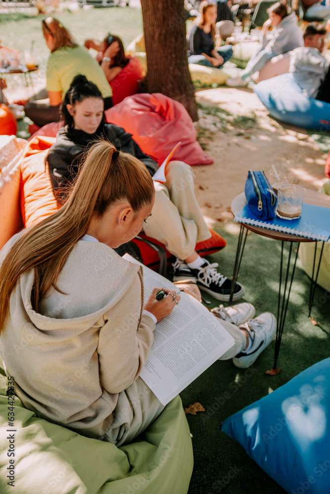 High school girls studying in a coffee bar