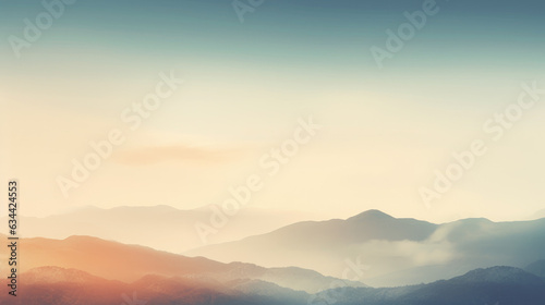 Dreamy mountains with autumn background during sunset or sunrise. Elegant and minimalistic style wallpaper with copy space in orange  yellow colors.