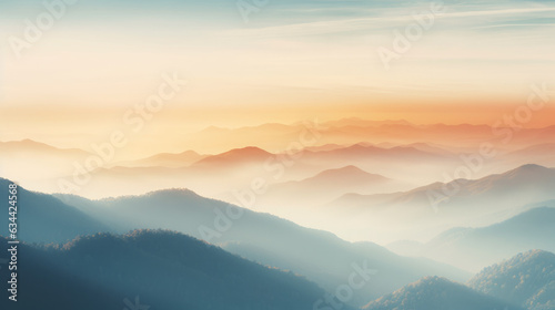 Dreamy mountains with autumn background during sunset or sunrise. Elegant and minimalistic style wallpaper with copy space in orange, yellow colors.
