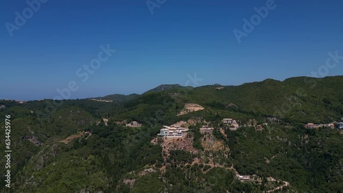  Aerial drone footage of Palaiokastritsa, a beautiful village with stunning beaches in northwestern Corfu photo