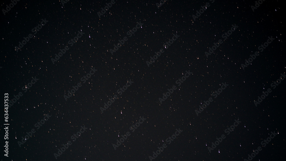 Starry sky. Night sky. Starfall on the night of August 12 to August 13. Falling star. Texture, background.