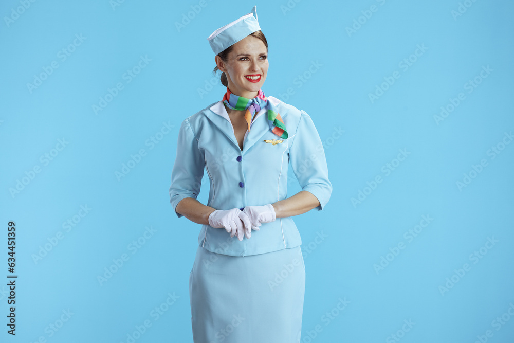 smiling modern flight attendant woman on blue smiling modern flight attendant woman on blue