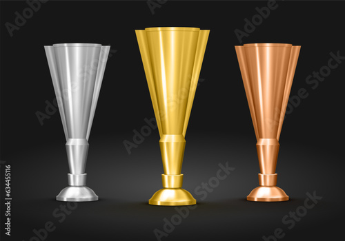 Gold, silver and bronze winners cup. Metallic trophy cup. Vector illustration.