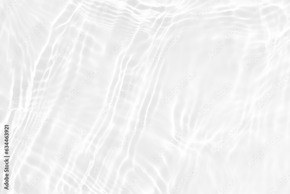 Obraz premium White water with ripples on the surface. Defocus blurred transparent white colored clear calm water surface texture with splashes and bubbles. Water waves with shining pattern texture background.