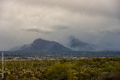 Looking Across Tucson At The Foggy Rincon Mountains