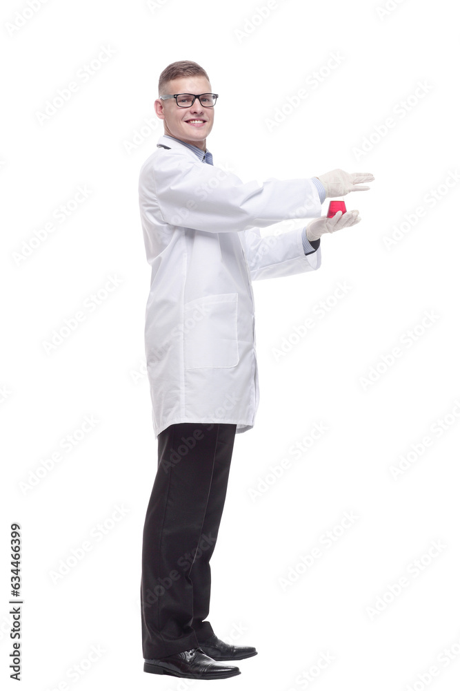 in full growth. smiling doctor with a laboratory flask. in full growth. smiling doctor with a laboratory flask.