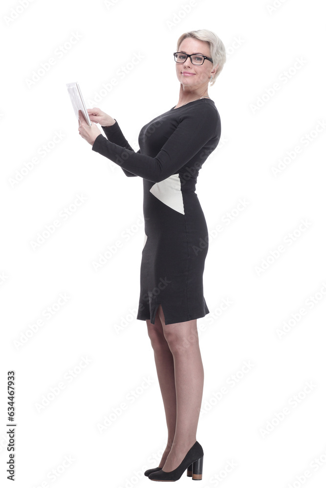 side view. attractive business woman using her digital tablet. side view. attractive business woman using her digital tablet.