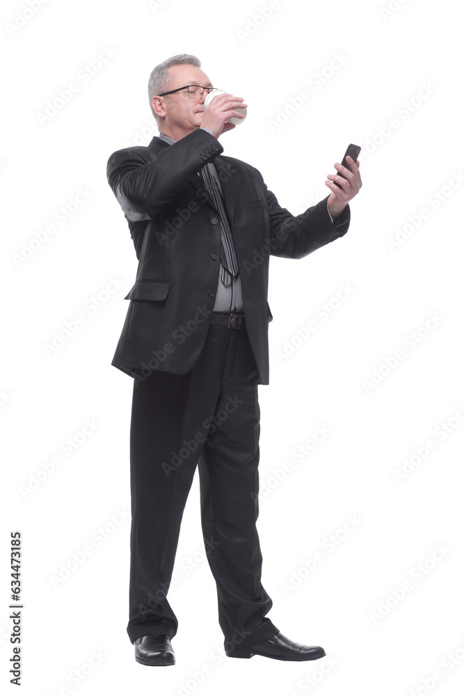 Business man with smartphone drink coffee and look at camera