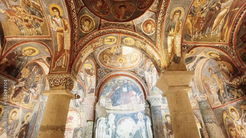 The interior of  the Dark Church or Yılanlı Kilise in Cappadocia ancient cave building in Turkey. Historical cave church.
