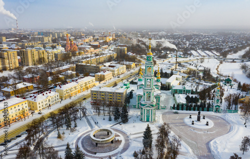 Top view of the Spaso-Preobrazhensky Cathedral on the square in the city center and residential areas of Tambov ..in winter, Russia.. photo