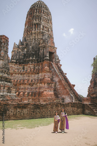  little girl  Thai traditional dress  with ancient ruin © focus_bell