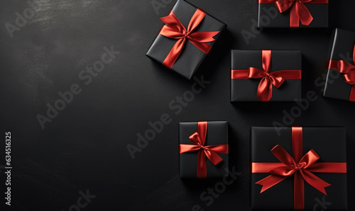 black gift box with red bow