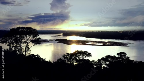 The Rio Napo River in the Ecuadorian Amazon during evening ambiance. photo