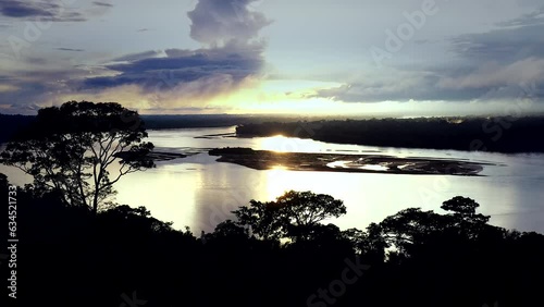 The Rio Napo River in the Ecuadorian Amazon during evening ambiance.