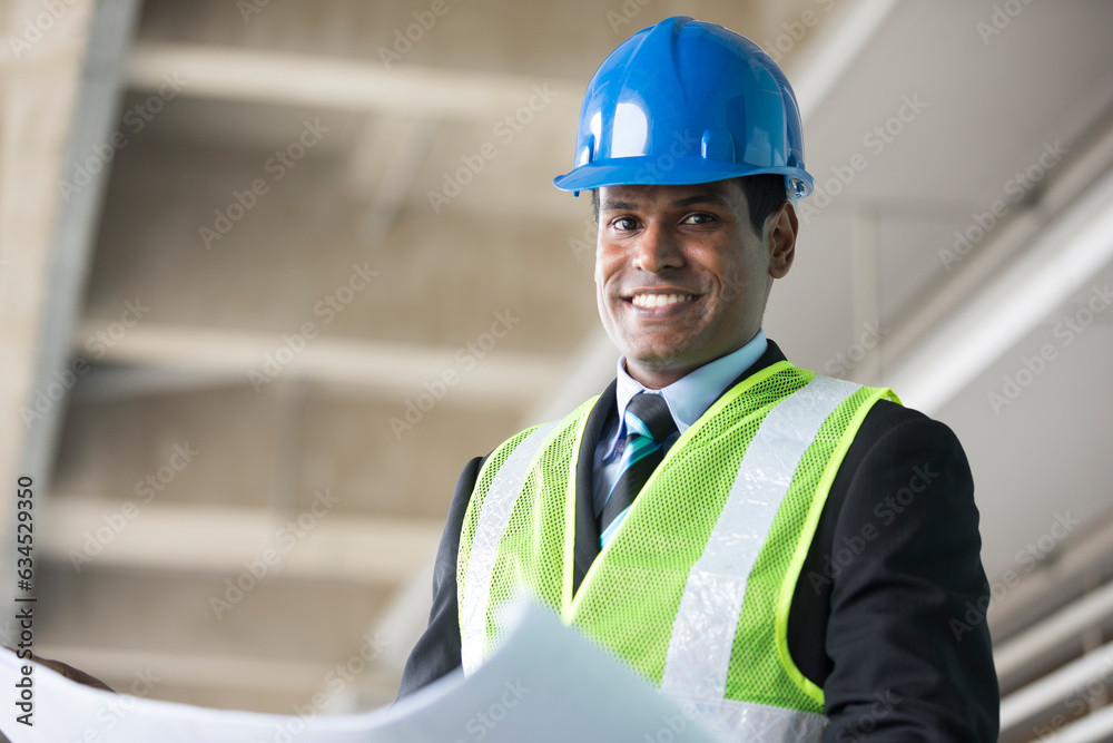 Indian Architect or industrial engineer at work. Indian Architect or industrial engineer at work.