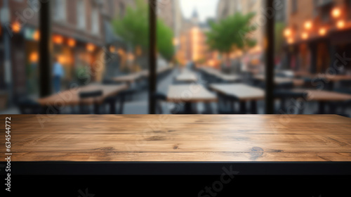 Empty black table top counter desk background with and blurred city