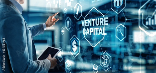 Businessman touching finger Venture Capital. Mixed Media