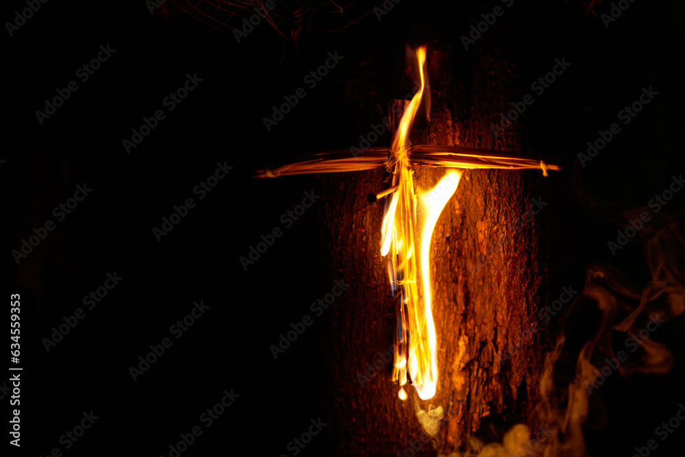 concept of halloween burn fire curse straw doll Japanese wara ningyo