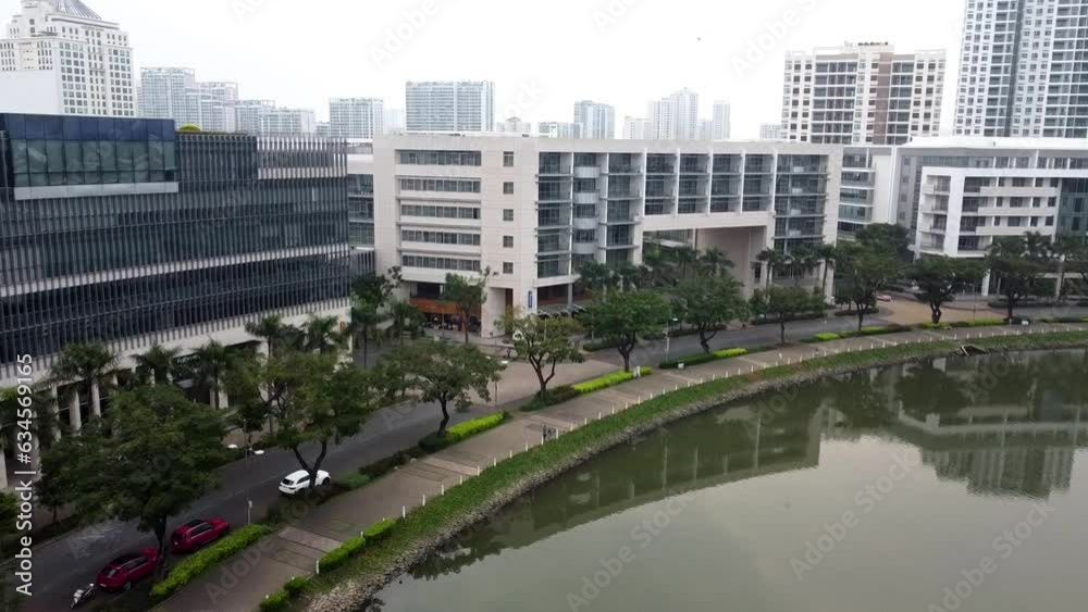 Drone dolly towards luxury condos rises to reveal ho chi minh city skyline vietnam