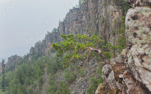 Rocks of Aigir in the smoke of a forest fire. Bashkortostan. photo