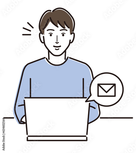 PCでメールをチェックする男性