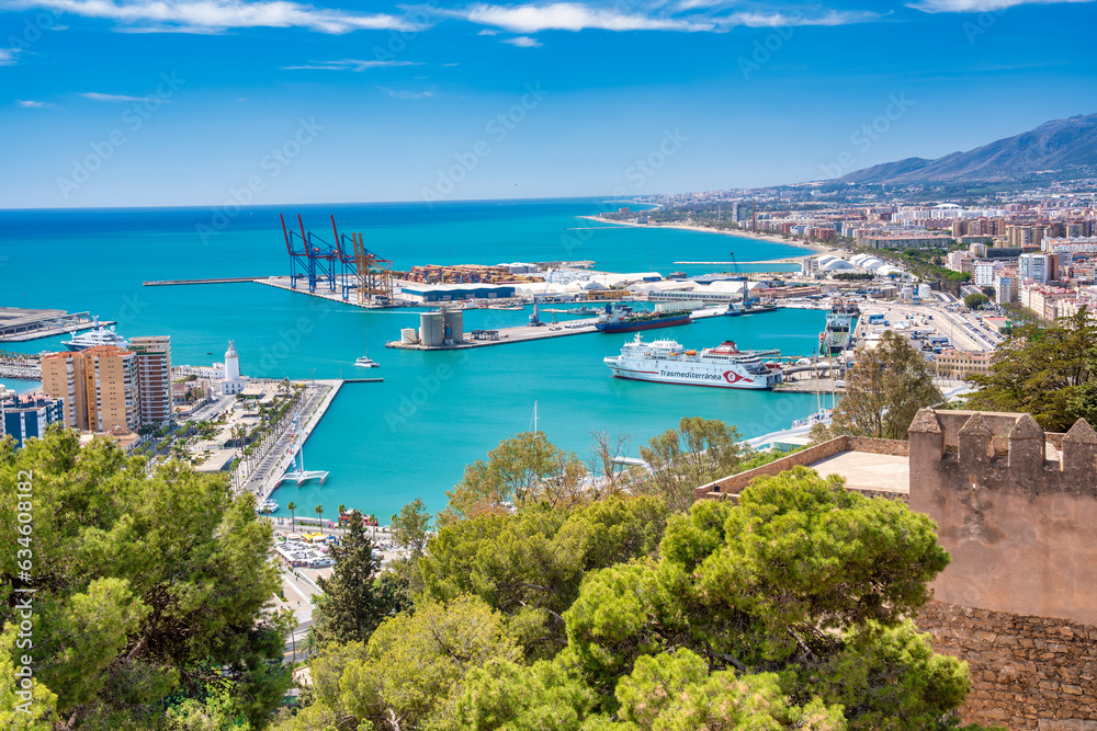 Malaga, Spain - April 14, 2023: Aerial view of Malaga port and city skyline from Gibralfaro Castle