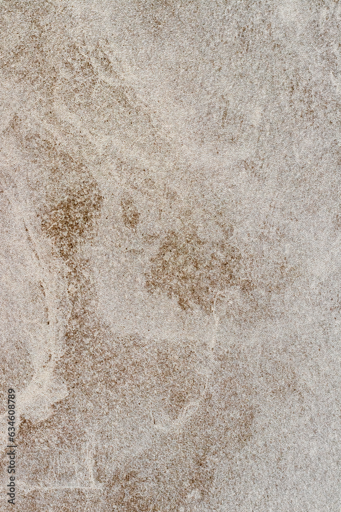Rough stone texture with a light brown hue, background for design Rough stone texture with a light brown hue, background for design