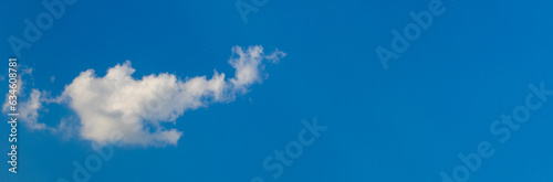 A lonely white cloud in the blue sky  copy space