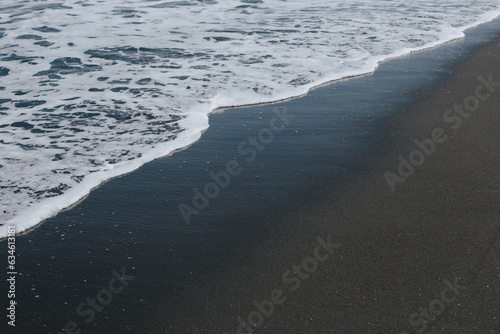 Sea wave on a sandy beach