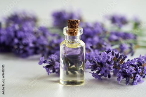 Lavender essential oil on a white table