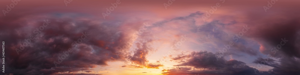 Dramatic sunset sky panorama with bright glowing red pink Cumulus clouds. HDR 360 seamless spherical panorama. Sky dome in 3D, sky replacement for aerial drone panoramas. Climate and weather change.