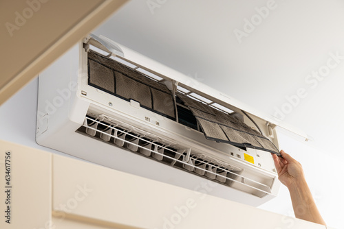 Air conditioner repair, preparing for summer season photo