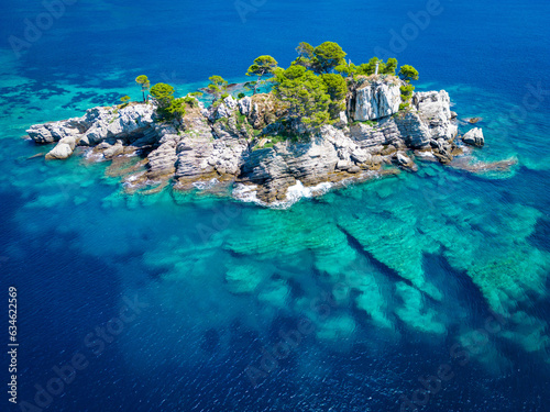 Church on the rock on Katic islet in Petrovac na Moru Aerial View. Beaches and coastline of the Adriatic Sea at summer time. Natural landscapes of Montenegro. Balkans. Europe. photo