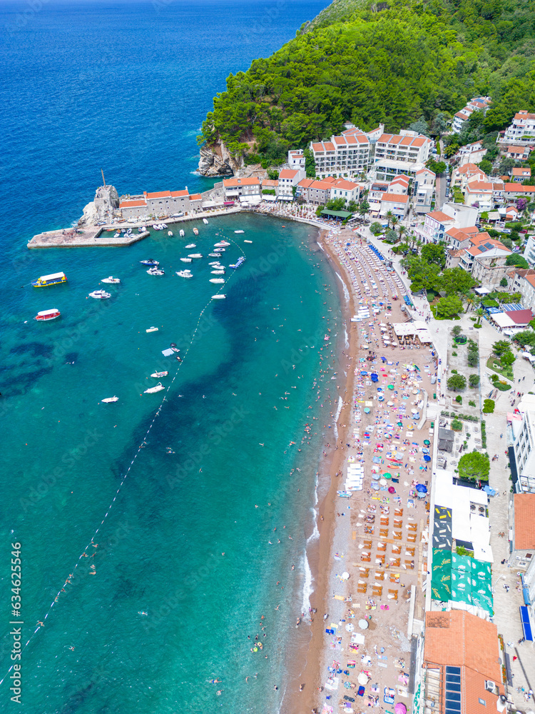 Petrovac na Moru Aerial View.  Beaches and coastline of the Adriatic Sea at summer time.  Natural landscapes of Montenegro. Balkans. Europe. 
