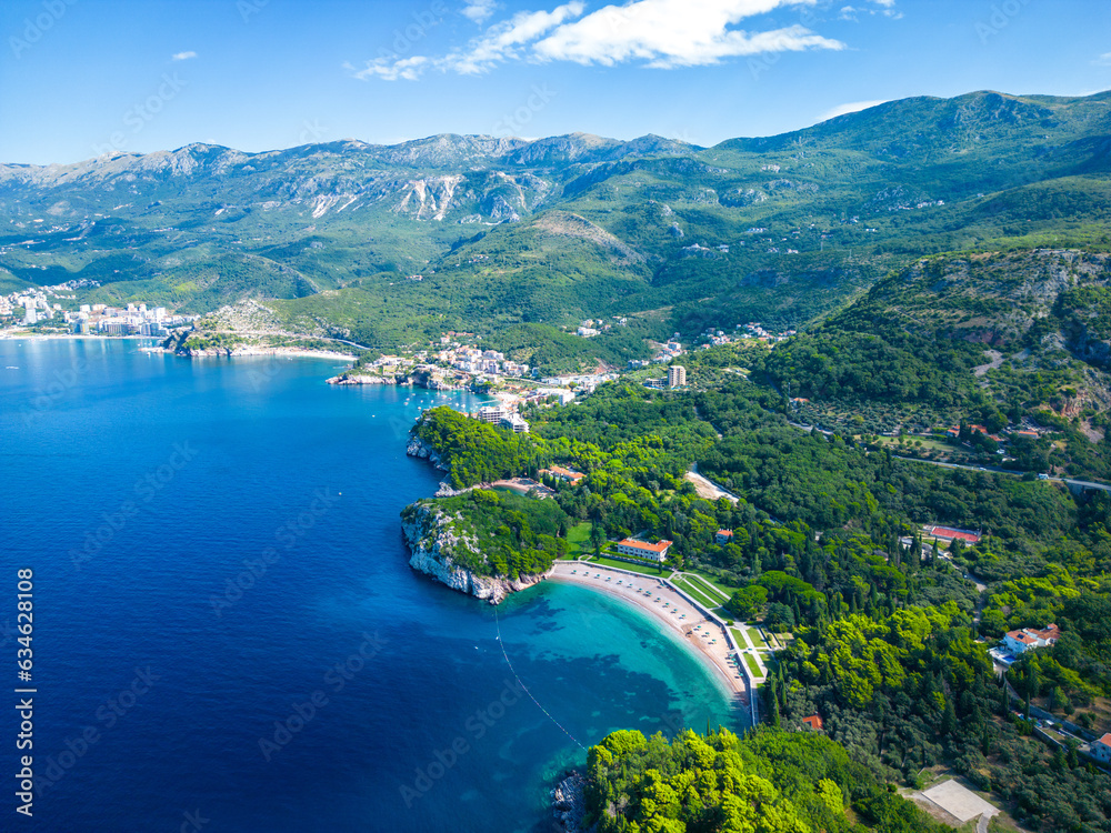 Queen's Beach in Milocer, Montenegro. Aerial view of sea waves and coast, Montenegro. Balkans. Europe. Queen's Beach in Milocer, Montenegro. Aerial view of sea waves and coast, Montenegro. Balkans. Europe.