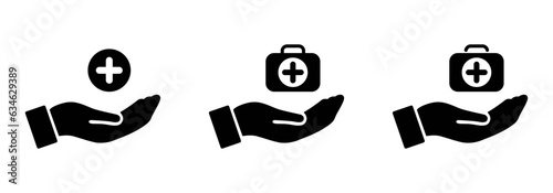 First aid kit icon on hand set of three. Flat illustration of first aid kit vector icon for web design. First Aid Kit Icon on Palm Hand Vector Illustration in Black and White color.