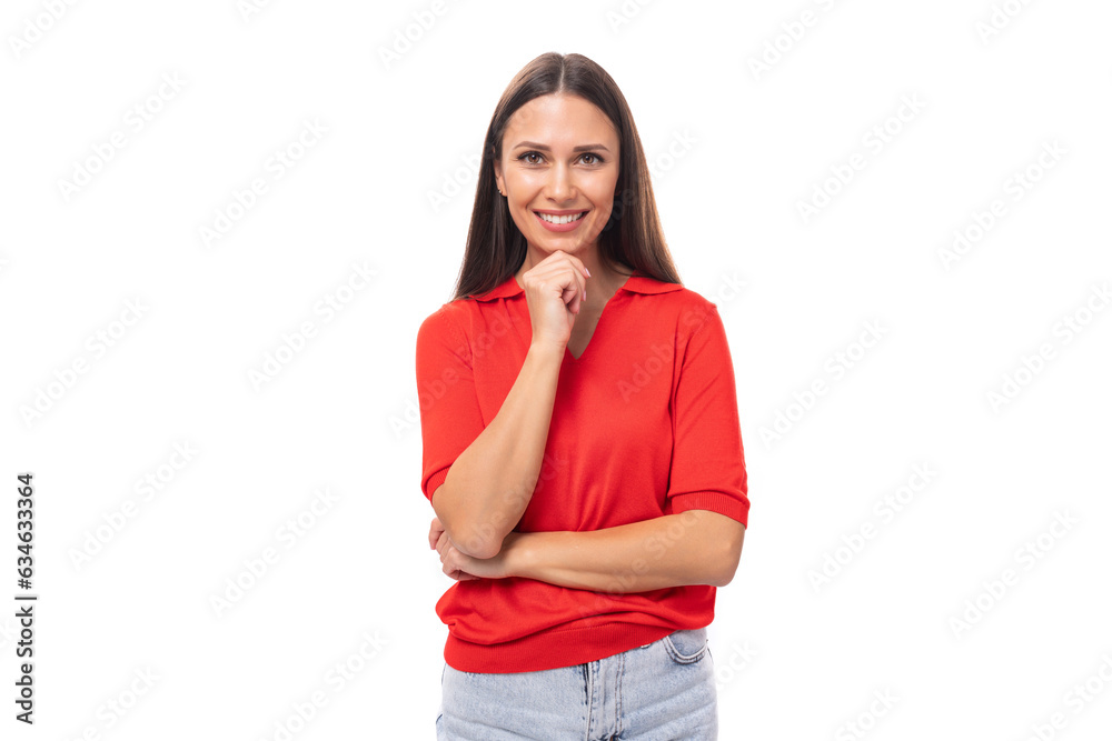 young charming european woman with black hair is dressed in a red t-shirt on a white background young charming european woman with black hair is dressed in a red t-shirt on a white background